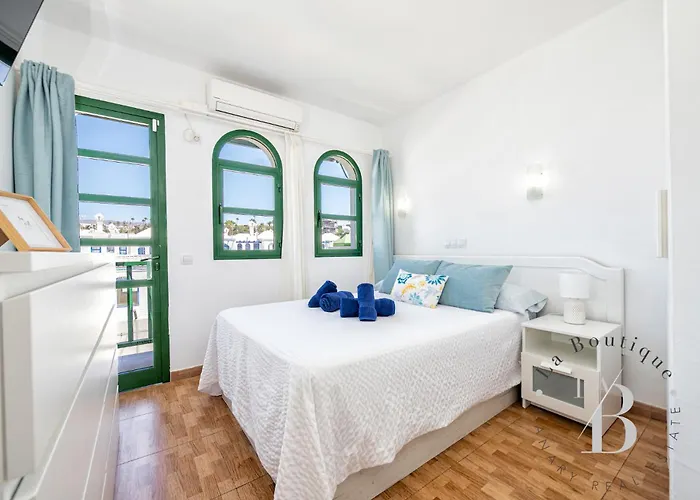 Дом отдыха Coqueto Bungalow Con Terraza Privada Y Piscina Маспаломас